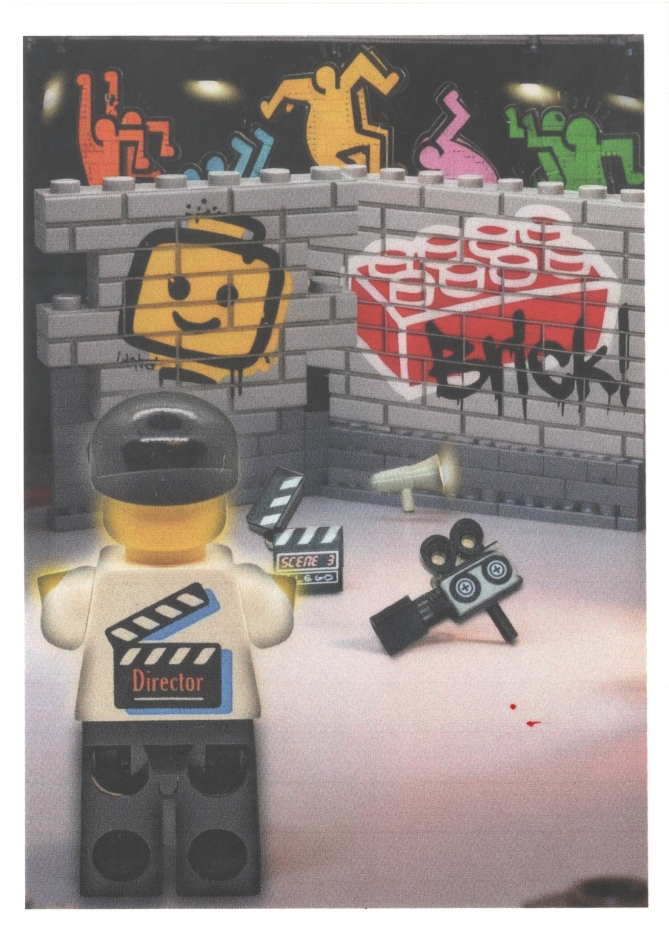 alt="frontecartolinaBricksceneRebus"